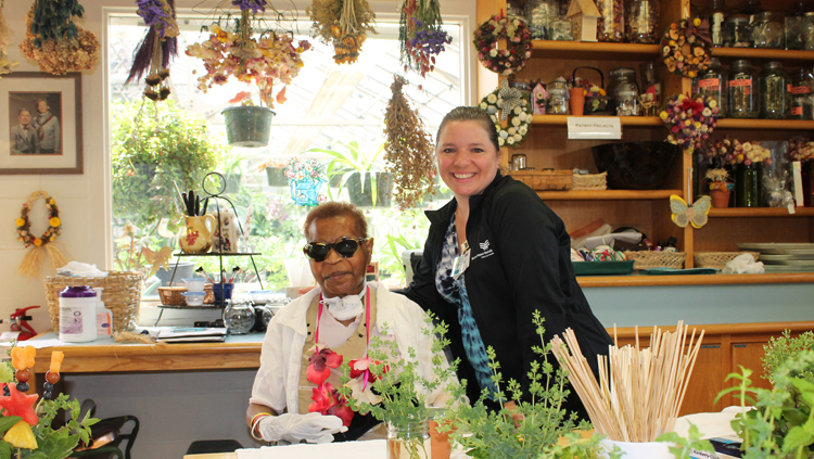 Therapist and patient in the Horticultural Therapy Center